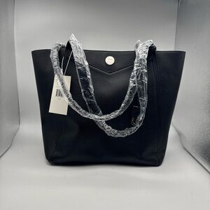 Jessica Moore black handbag New with defect